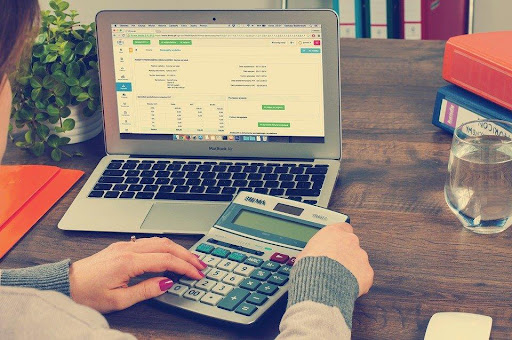 a female accountant working on a laptop