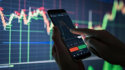 A-Person-Viewing-A-Graph A Person Viewing A Graph On A Phone